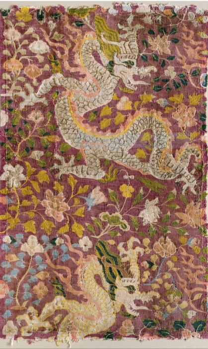 Image of a silk tapestry of a dragon and flowers